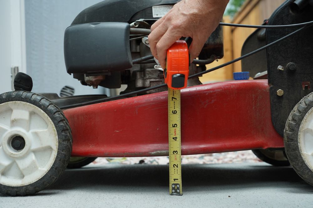 Raising mower height in hot weather